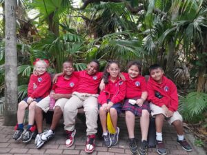 Students in red shirts